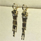 C Cheetah Earrings - showing the charm of courage, naughty or docile .18K gold, lacquer, diamond, shafle garnet, Onyx supplier