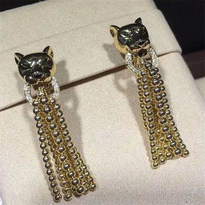 China C earrings, 18K gold, inlaid with 34 round bright cut diamonds, Shafrey garnet leopard eyes, Onyx factory in China supplier