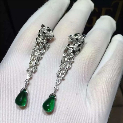 China C Cheetah Earrings - showing the charm of courage, naughty or docile .310 round bright cut diamonds, emerald and onyx. supplier