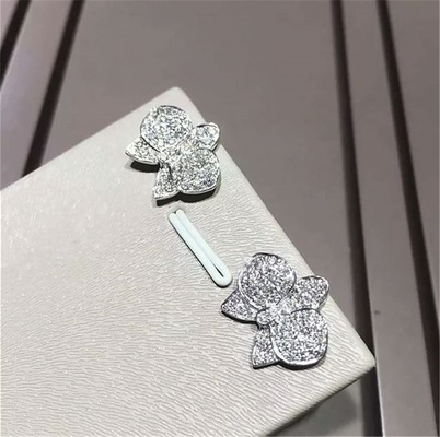 C orchid Earrings 18K white gold, each with 27 diamonds.Carving delicate petals with precious materials