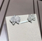 C orchid Earrings 18K white gold, each with 27 diamonds.Carving delicate petals with precious materials